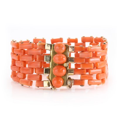 Lot 109 - A gold and coral bracelet
