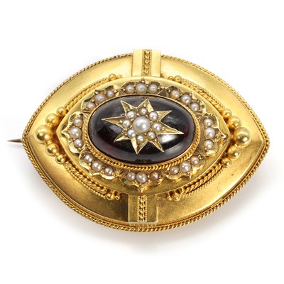 Lot 31 - A Victorian garnet and split pearl mourning brooch