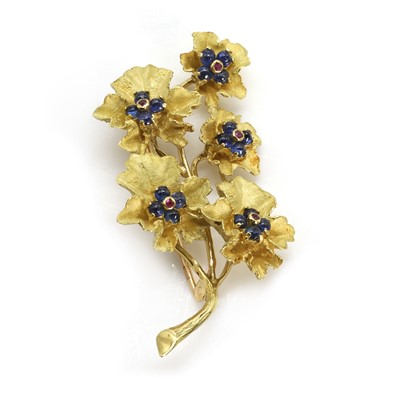 Lot 121 - An 18ct gold sapphire and ruby spray brooch