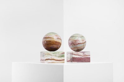 Lot 170 - A pair of onyx paperweights