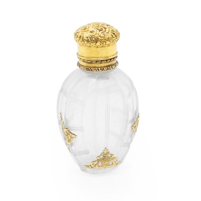 Lot 106 - A gold mounted and cut glass scent bottle