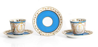 Lot 218 - A pair of Sèvres-style porcelain cups and saucers
