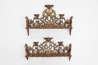 Lot 272 - A near pair of mahogany and parcel-gilt hanging shelves