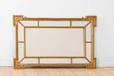 Lot 444 - A carved giltwood mirror