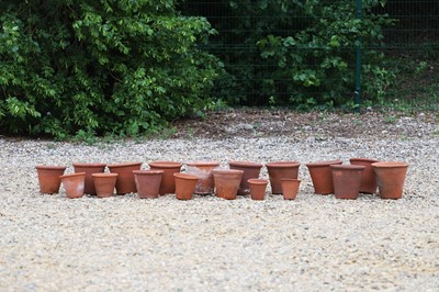 Lot 621 - A group of hand-thrown terracotta pots