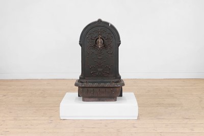 Lot 228 - A painted cast iron wall fountain