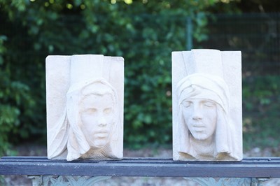 Lot 634 - A pair of carved stone corbels