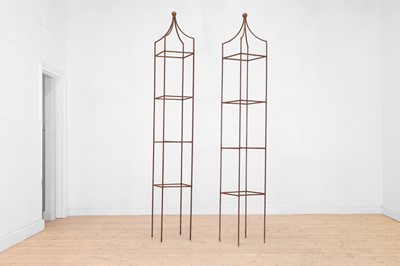 Lot 642 - A pair of wrought-iron garden obelisks