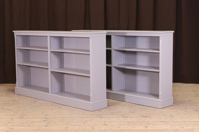 Lot 99 - A pair of painted wooden bookcases