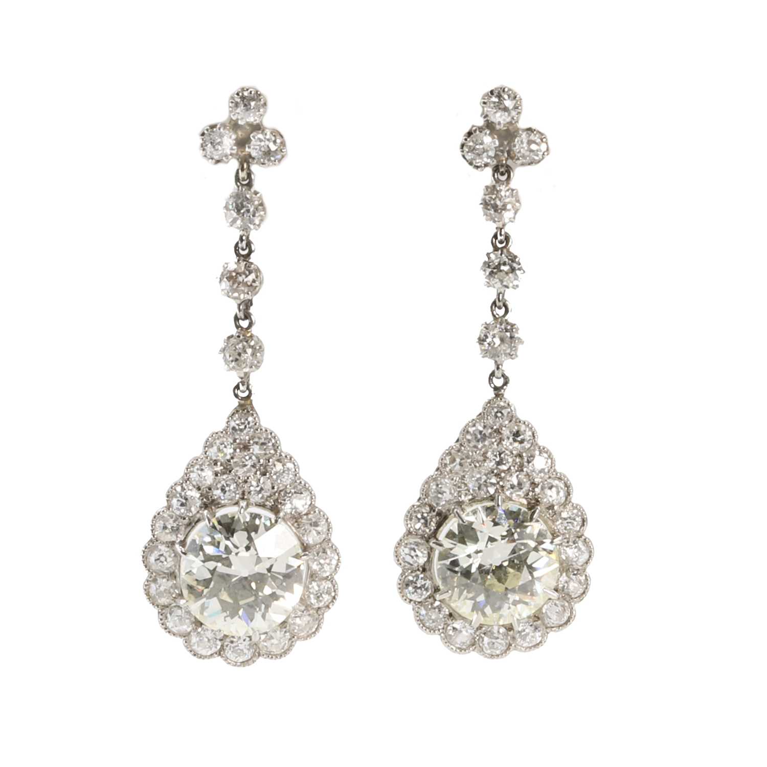 Lot 72 - A pair of early 20th century diamond drop earrings