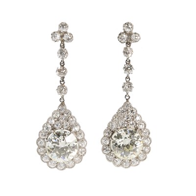Lot 72 - A pair of early 20th century diamond drop earrings
