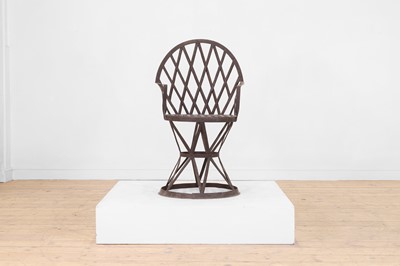 Lot 544 - A wrought-metal chair