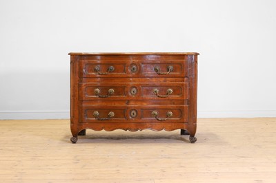 Lot 598 - A Louis XV provincial walnut commode