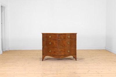Lot 412 - A George III mahogany serpentine dressing commode