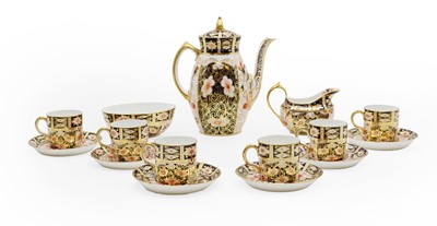 Lot 267 - A Crown Derby 'Imari' porcelain coffee service