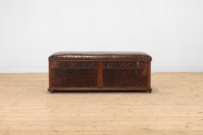 Lot 476 - A walnut and studded leather ottoman