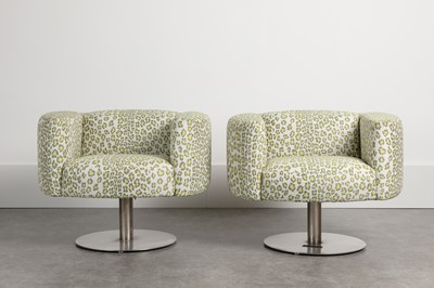 Lot 337 - A pair of revolving armchairs