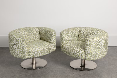 Lot 337 - A pair of revolving armchairs