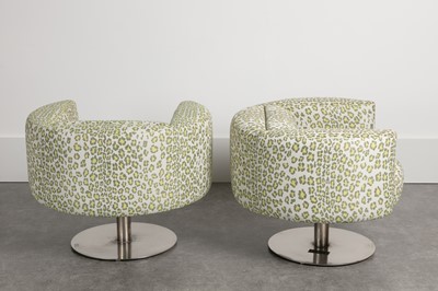 Lot 337 - A pair of revolving armchairs