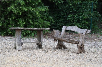 Lot 625 - A primitive wooden bench