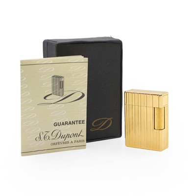Lot 18 - A gold-plated cigarette lighter by St Dupont