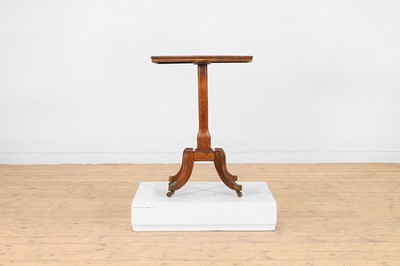 Lot 103 - A Regency rosewood and brass occasional table