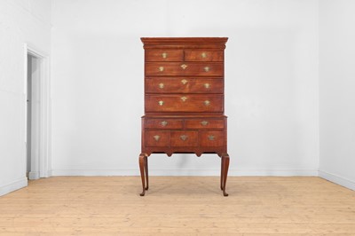 Lot 192 - A maple chest-on-stand or 'highboy'