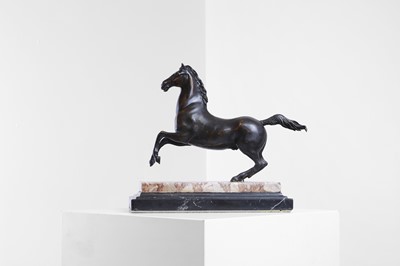 Lot 343 - A patinated bronze model of a rearing horse