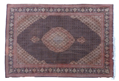 Lot 502 - A Tabriz wool carpet