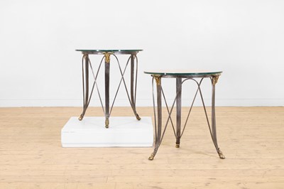 Lot 501 - A pair of Louis XVI-style steel and brass occasional tables