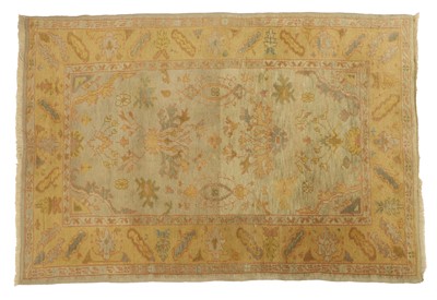 Lot 498 - An Oushak wool carpet