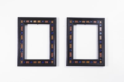 Lot 563 - A pair of ebony and specimen stone frames