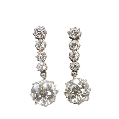 Lot 73 - A pair of Edwardian diamond pendant earrings