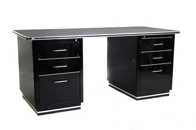 Lot 545 - A black and chrome metal pedestal desk