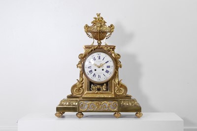 Lot 202 - A Louis XV-style ormolu mantel clock