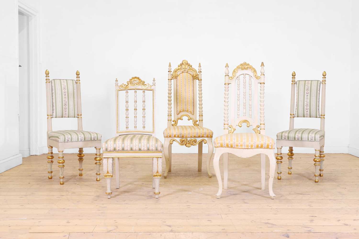 Lot 35 - A group of painted and parcel-gilt side chairs