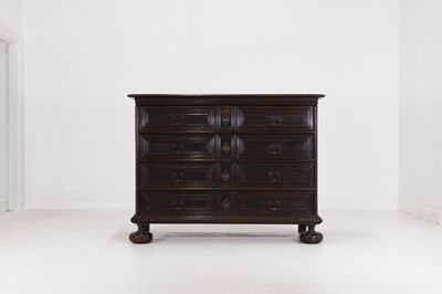 Lot 36 - A large baroque walnut commode or cassettone
