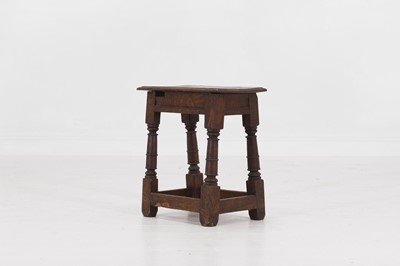 Lot 28 - An oak joint stool