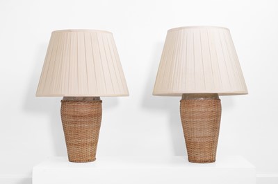 Lot 603 - A pair of wicker table lamps