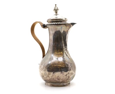 Lot 31 - A George III silver hot water jug