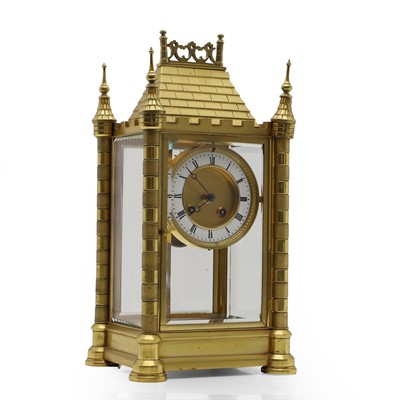 Lot 342 - A gilt brass and glass cased mantel clock
