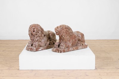 Lot 613 - A pair of Renaissance-style carved rouge marble lions
