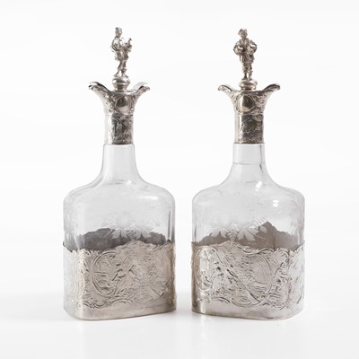 Lot 20 - A pair of silver-mounted glass decanters