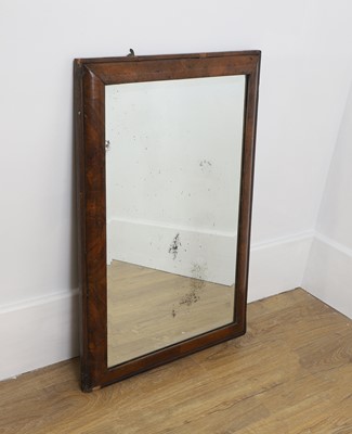 Lot 397 - A cushion framed walnut mirror