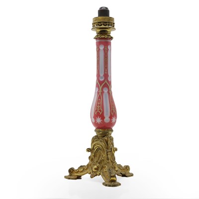 Lot 396 - A Bohemian cased glass and gilt oil lamp