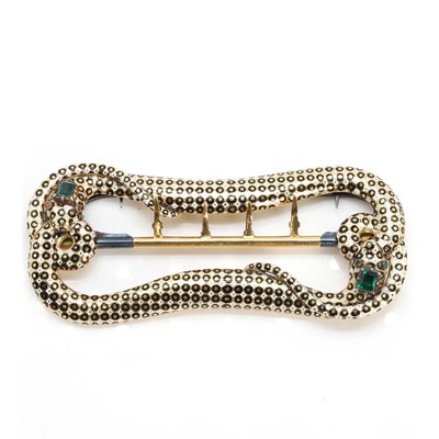 Lot 15 - A 19th century yellow metal and enamel snake belt buckle