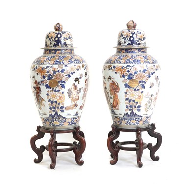 Lot 75 - A large pair of Japanese Imari porcelain vases and covers