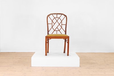 Lot 189 - A George III yew 'cockpen' side chair