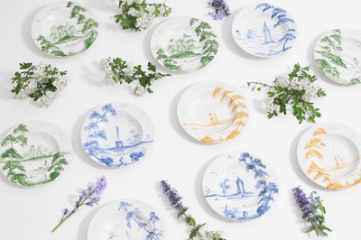 Lot 583 - A collection of tin-glazed plates by Isis Ceramics