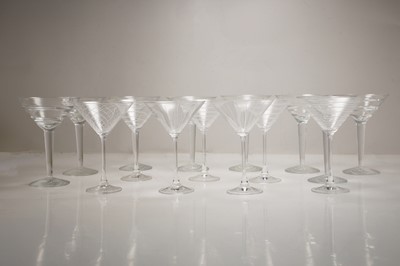 Lot 141 - A set of six cut glass martini glasses